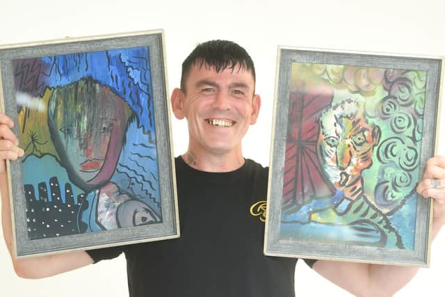 Artist Robert Haworth with some of his lockdown paintings, which are being shown in an exhibition at the Solaris Centre until August 19.