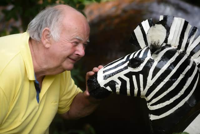 Roger and Susan have spent around £20,000 on steel sculptures to transform their garden into a life-size safari. Pic: Daniel Martino/JPI Media