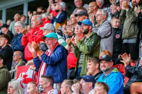 Fleetwood fans celebrate Shayden Morris' goal on their return to Highbury