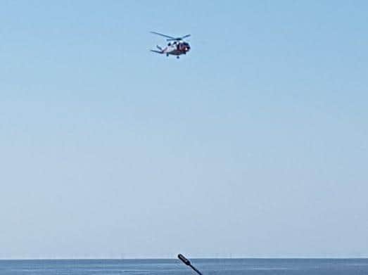A person was rushed to hospital after being rescued from the sea near North Pier. (Credit: HM Coastguard Fleetwood)