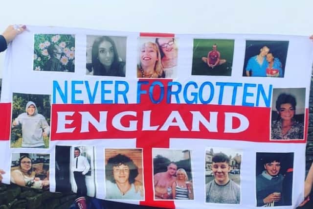 Climbers raised a flag in memory of loved ones lost to suicide