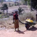 Water had to be carried in plastic bottles and a wheelbarrow before the bore holes were created