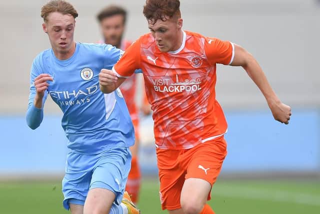 Blackpool looked to build from the back against Manchester City