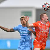 Lavery in action against Man City on Tuesday night