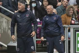 Neil Critchley (right) saw his Blackpool players draw at Bristol City