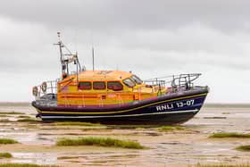 The Lytham St Annes relief all-weather lifeboat on the beach following the rescue and tractor winch failure