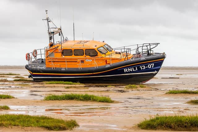 The Lytham St Annes relief all-weather lifeboat on the beach following the rescue and tractor winch failure
