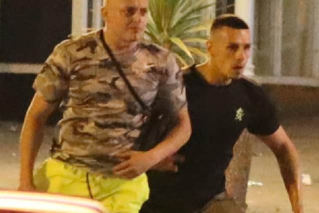 Police are keen to speak to these two men as part of an investigation into an incident in Queen Street at 1.30am on Tuesday, July 27 which saw a man struck by a car. Pic: Lancashire Police