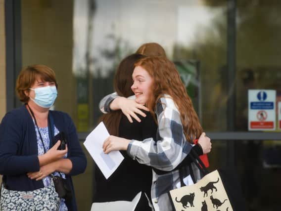 Emotional embraces as students picked up their A-level exam results at Blackpool Sixth.
