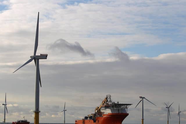 Swapping fossil fuels for renewable energy will help. Here we see the Walney windfarm off the Lancashire coast
