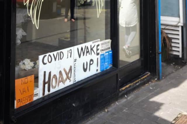 The shop's owner, Victoria Mackay, said the sign is there to provoke a reaction