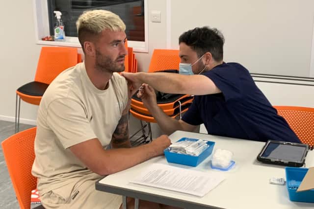 Blackpool FC striker Gary Madine gets the Covid-19 vaccine. A vaccine van will be at Bloomfield Road ahead of the Seasiders’ match with Cardiff City, so supporters can get their jabs