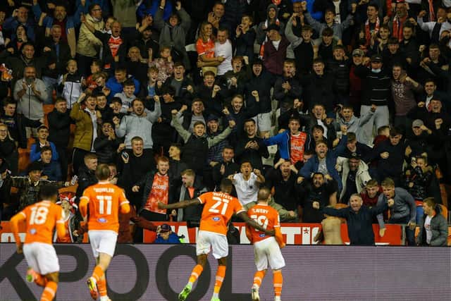 Blackpool's players and fans celebrate against Middlesbrough in midweek