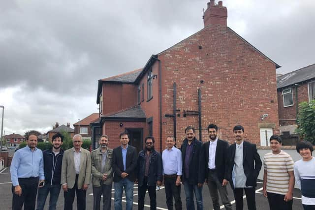 Society officials and members of the community at the centre in St Annes