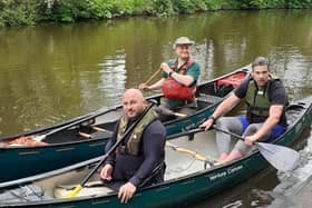 Rick Clement (left) in the canoe with Mark Harding, with  Dave Seddon, a volunteer from Ribble Canoe Club, in the canoe behind them
