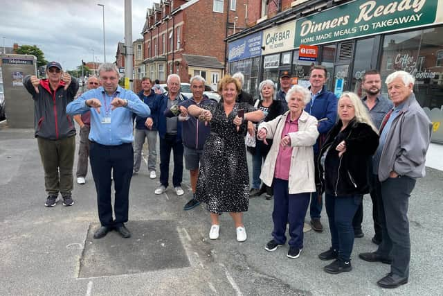 Residents and councillors protesting at the proposed site for a mast on Whitegate Drive