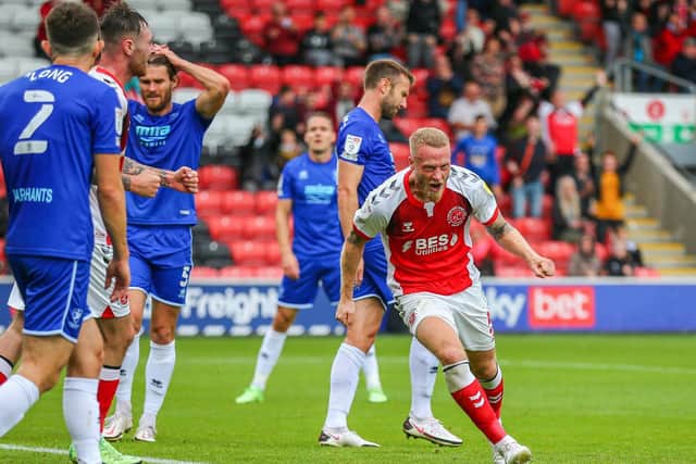 Tom Clarke scored Fleetwood's first goal to set them on their way to a first victory of the season