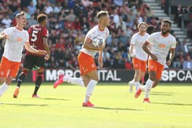 Blackpool fought back from two goals down to draw yesterday