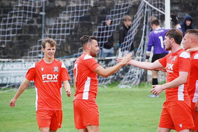 AFC Blackpool celebrate a goal at Bacup