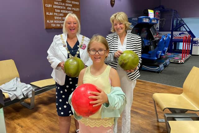 Coun Andrea Kay, Coun Lynne Bowen and Evie Abram play a game of bowling at one of Wyre Council's holiday clubs. Pic: Wyre Council