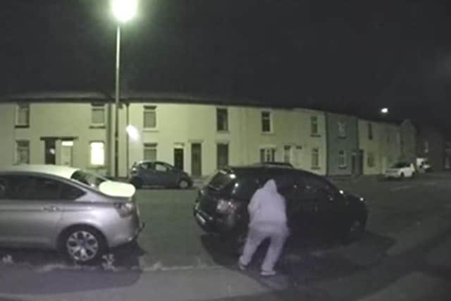 A doorbell camera caught the moment a car was vandalised by a man in Fleetwood. (Credit: Lancashire Police)