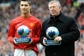 Manchester United's Alex Ferguson and Cristiano Ronaldo receive their manager and player of the month trophies in 2008