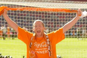 Clarke celebrates Blackpool's promotion to the Premier League in 2010