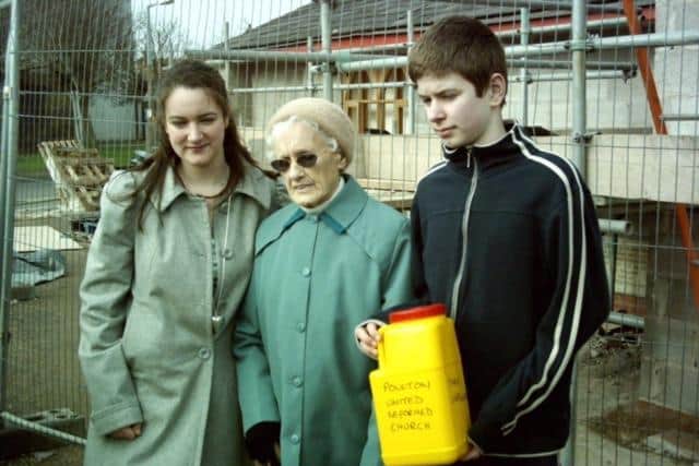 Laura and her brother Thomas with Lily Watson, who buried the time capsule at Poulton United Reformed Church in 2007