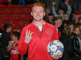 Fleetwood Town striker Callum Morton with the matchball after his 'perfect' hat-trick in the Papa John's Trophy win over Leicester City Under-21s