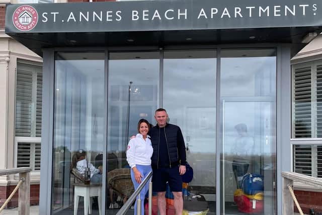 Zoe Robertson, owner of St Annes Beach Huts & Apartments, with Wayne Rooney during his family's stay on the seafront at the weekend. Pic: St Annes Beach Huts & Beach Apartments