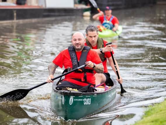 Rick Clement (front) and Mark Harding during their canoe fundraising challenge