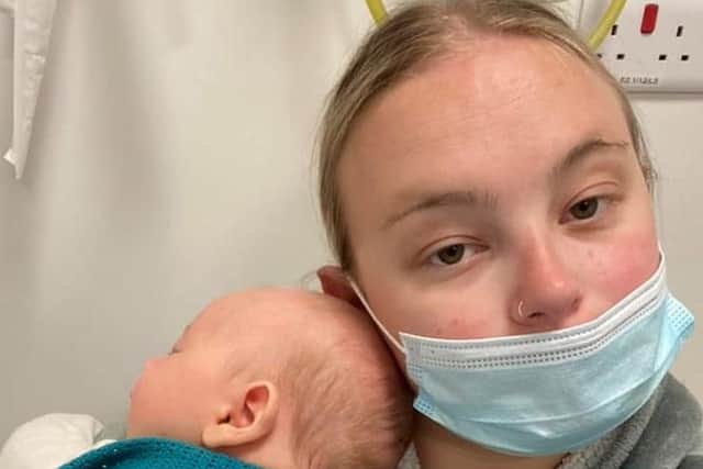 Amber Yates with her 6-week-old baby Elliot in A&E after the family's carbon monoxide poisoning. Pic: Amber Yates