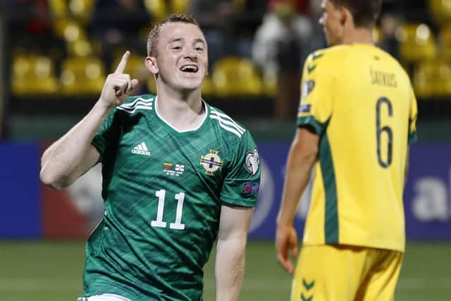Lavery celebrates scoring his first goal for Northern Ireland. Picture: PA