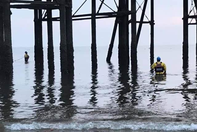 Coastguard and RNLI crews were called to reports of a person in the water clinging onto the legs of the North Pier in Blackpool at around 7.10pm last night (Sunday, September 5). Pic: HM Coastguard Fleetwood