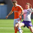 Josh Vela (right) in action against Blackpool last season