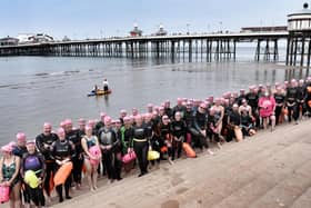 While the water was only 54F, 12.2 C, this didn’t deter participants. Many had wetsuits on, though a few seasoned open water swimmers swam without
