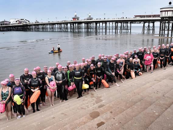 While the water was only 54F, 12.2 C, this didn’t deter participants. Many had wetsuits on, though a few seasoned open water swimmers swam without