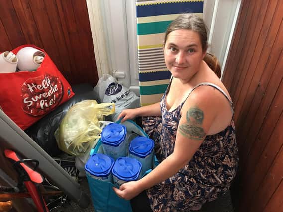 Coun Rachel George with items donated for Afghan refugees