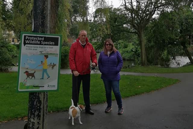 Coun Roger Small and local resident Alison Allen who has been visiting Ashton Gardens since 2016 and recently reported an injured swan.