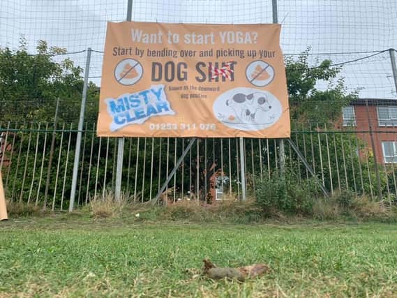 Dave Boyle, whose 10-year-old son plays for a grassroots junior football team at Fishers Field, attached the poster to fencing next to the Fishers Field football pitches in Highfield Road on Monday (September 6). Pic: Stephen Nightingale