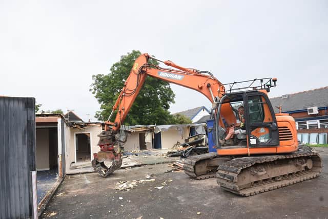 The demolition of Poulton Clinic is underway as the building is pulled down to make way for six new homes. Pic: Daniel Martino/JPI Media