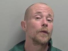 Lee Spittle (pictured) is described as being of average build, around 5ft 7in tall, with a shaved head and brown facial hair. (Credit: Warwickshire Police)
