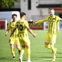 Alex Whitmore celebrates finding the net with AFC Fylde team-mate Nick Haughton Picture: Steve McLellan