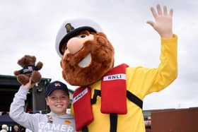 Jacob Sloan, nine, meets Lytham St Annes RNLI mascot Stormy Stan at the open day