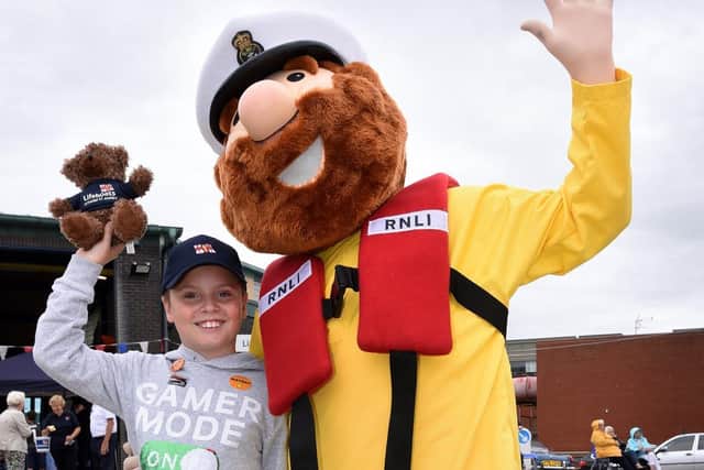 Jacob Sloan, nine, meets Lytham St Annes RNLI mascot Stormy Stan at the open day