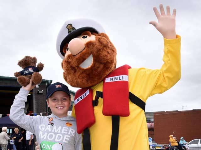 Jacob Sloan, nine, meets Lytham St Annes RNLI mascot Stormy Stan at the open day