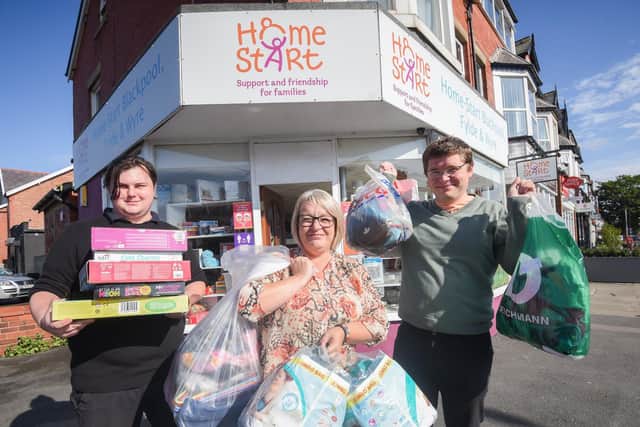 Home-Start shop manager Sue Uttley and shop assistants Kyle Torz and Samuel Toase with some of the donations.