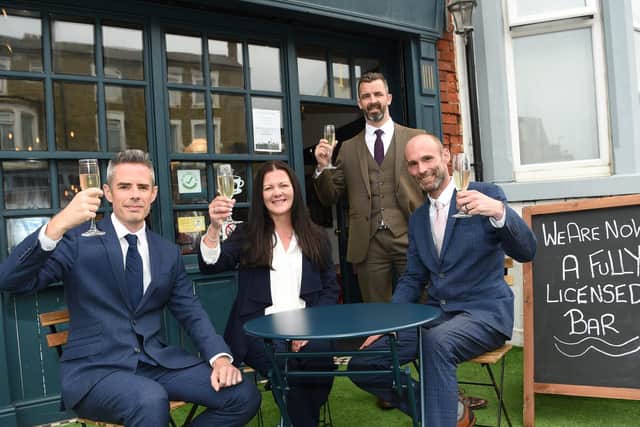 Blackpool Resort has created jobs thanks to the staycation effect and obtained a drinks licence at its cafe.

Pictured left to right are: Seated: David Edwards, partner at Harrison Drury; Mandy Hall, assistant manager at Blackpool Resort and general manager Mark Brockbank; Standing: Malcolm Ireland, head of leisure and licensing at Harrison Drury.