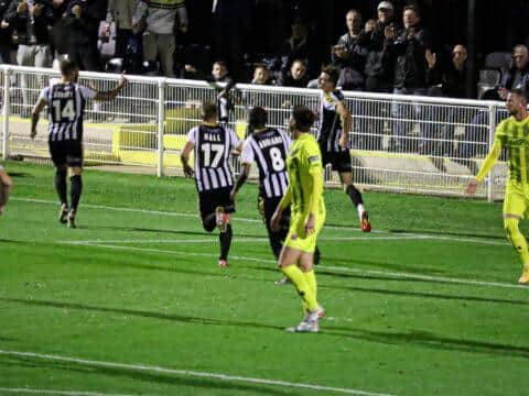 Spennymoore celebrate their winner against the Coasters