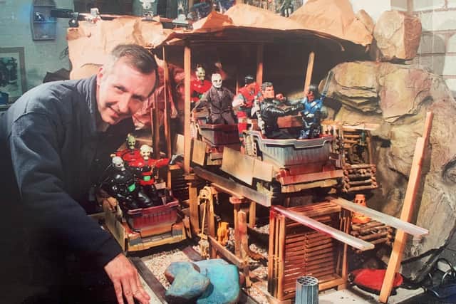 Richard Dixon with one if the sets he has built to complement his photography and, inset, with one of the models he created for Infinite Worlds movie